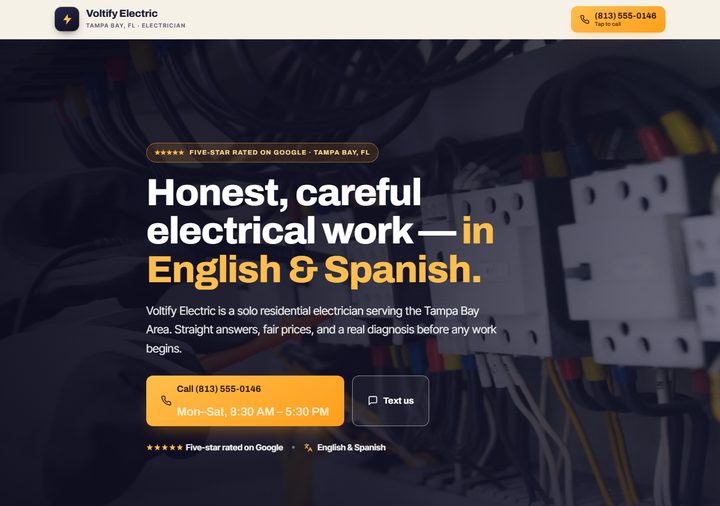 Electrician template preview — charcoal-indigo with amber accents