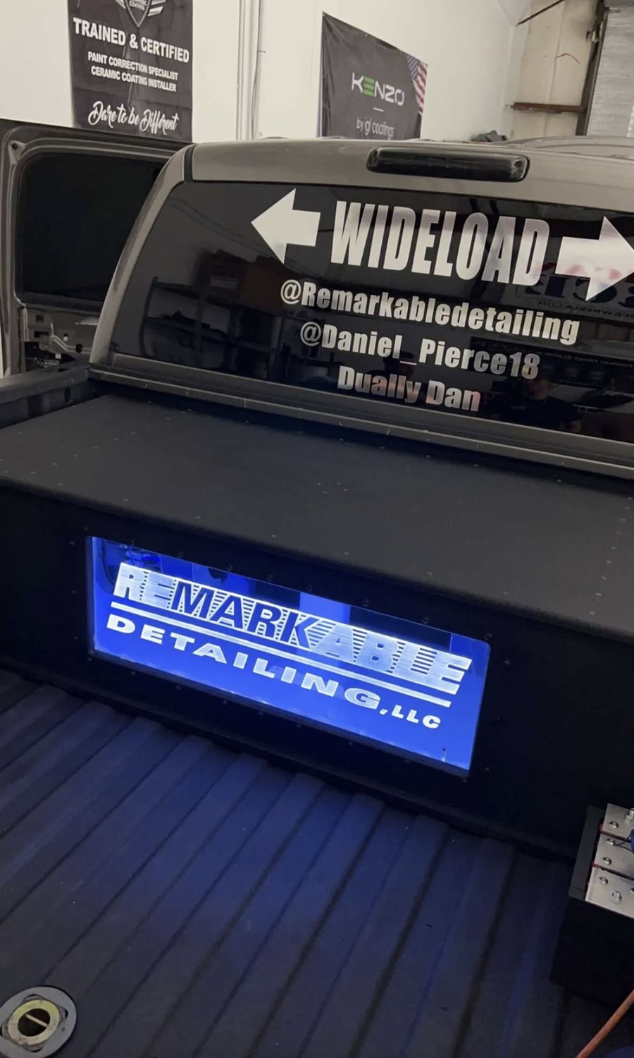 Bed-mounted audio build glowing with LED accent lighting at night