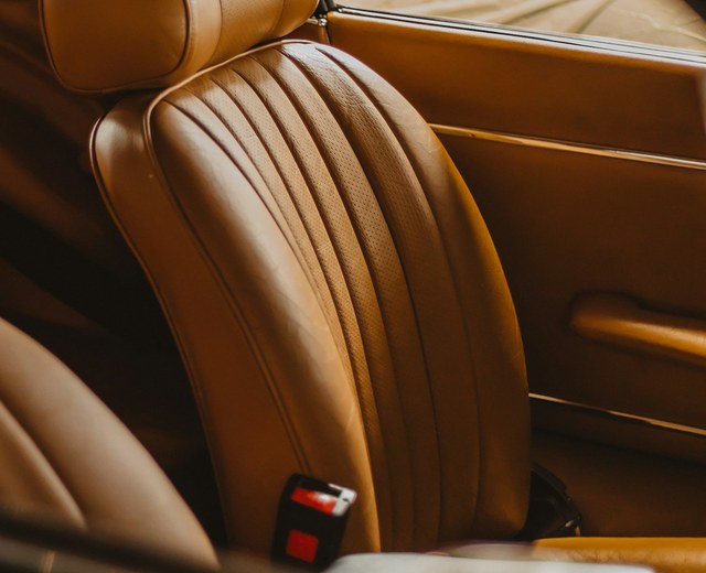 Classic car tan leather seat and door panel restored