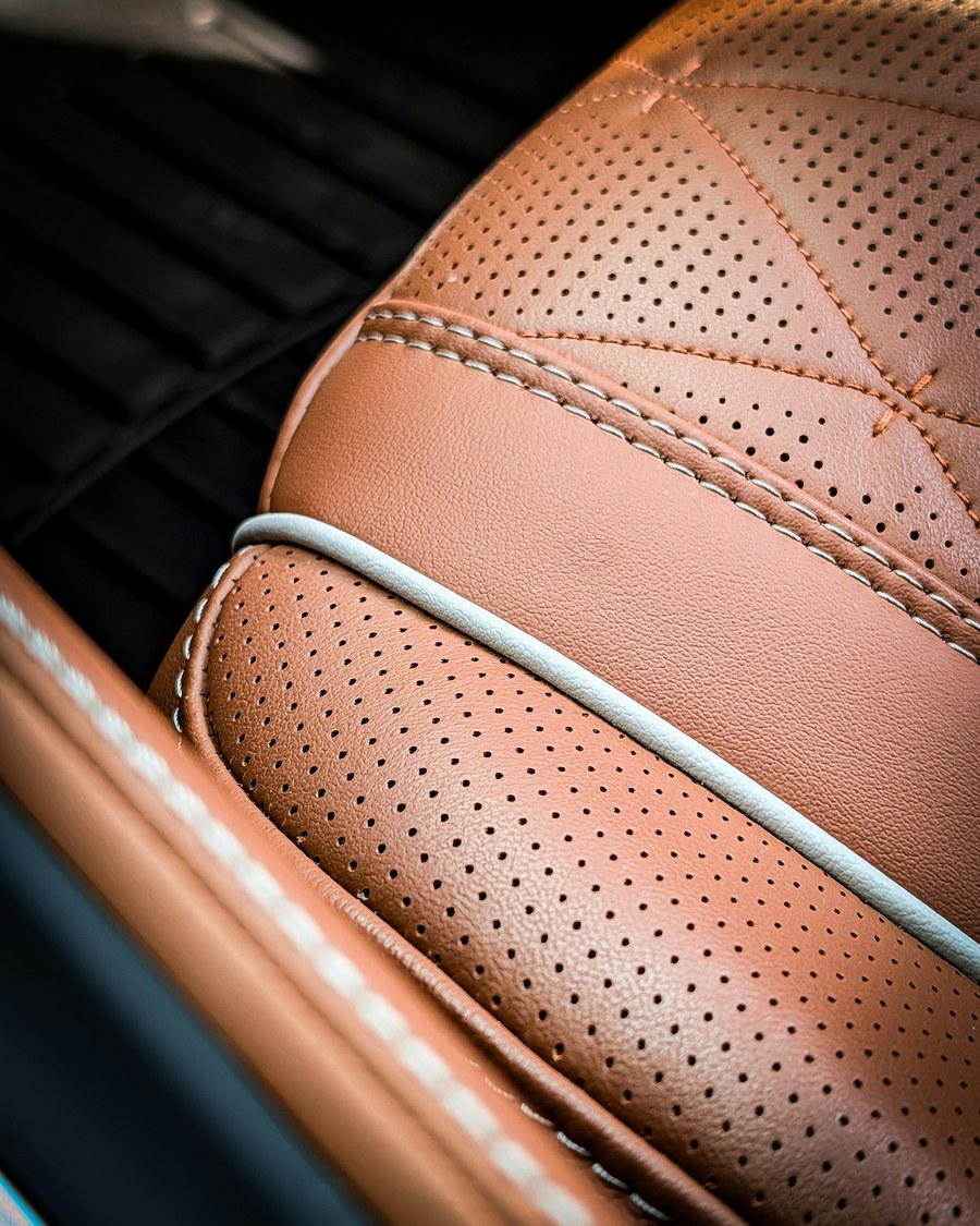 Custom stitched leather car seats restored to a flawless finish